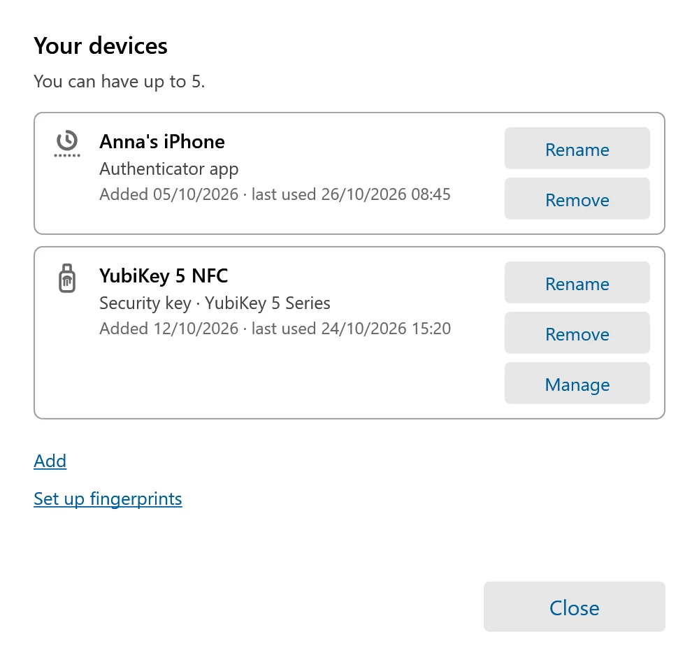 The Your devices window listing an authenticator app and a security key, each with Rename and Remove buttons, and links to add a device.